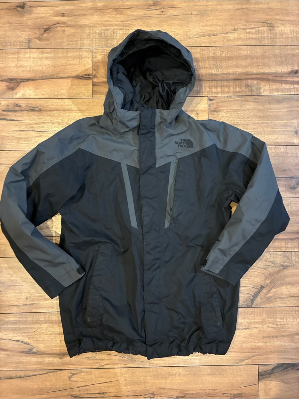 The North Face Black and Gray Hooded Rain Jacket